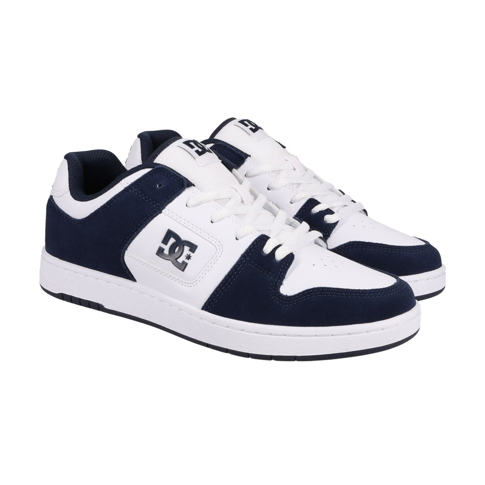 A pair of navy and white DC shoes.