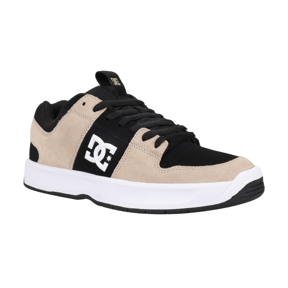 A beige and black shoe with white soles.