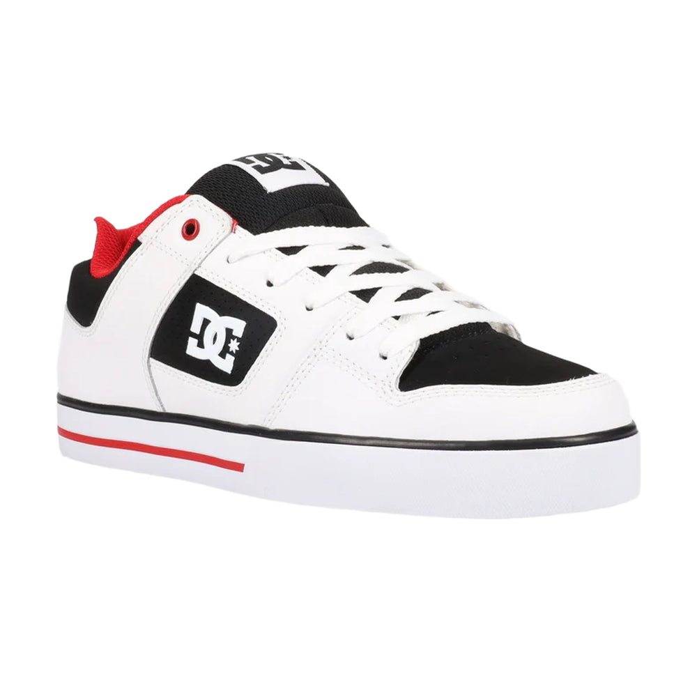 A white DC shoe with black and red highlights.