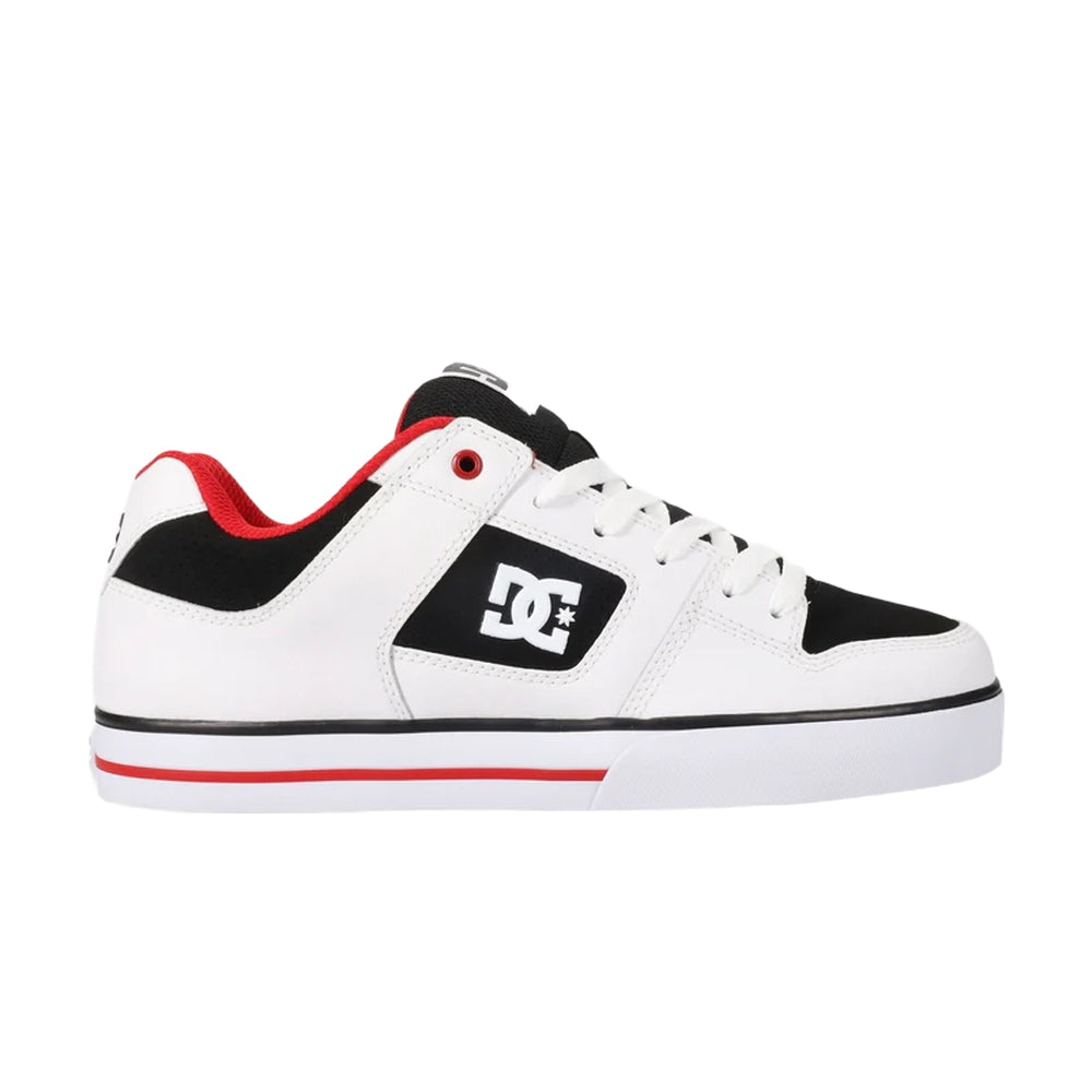 A white DC shoe with black and red highlights.