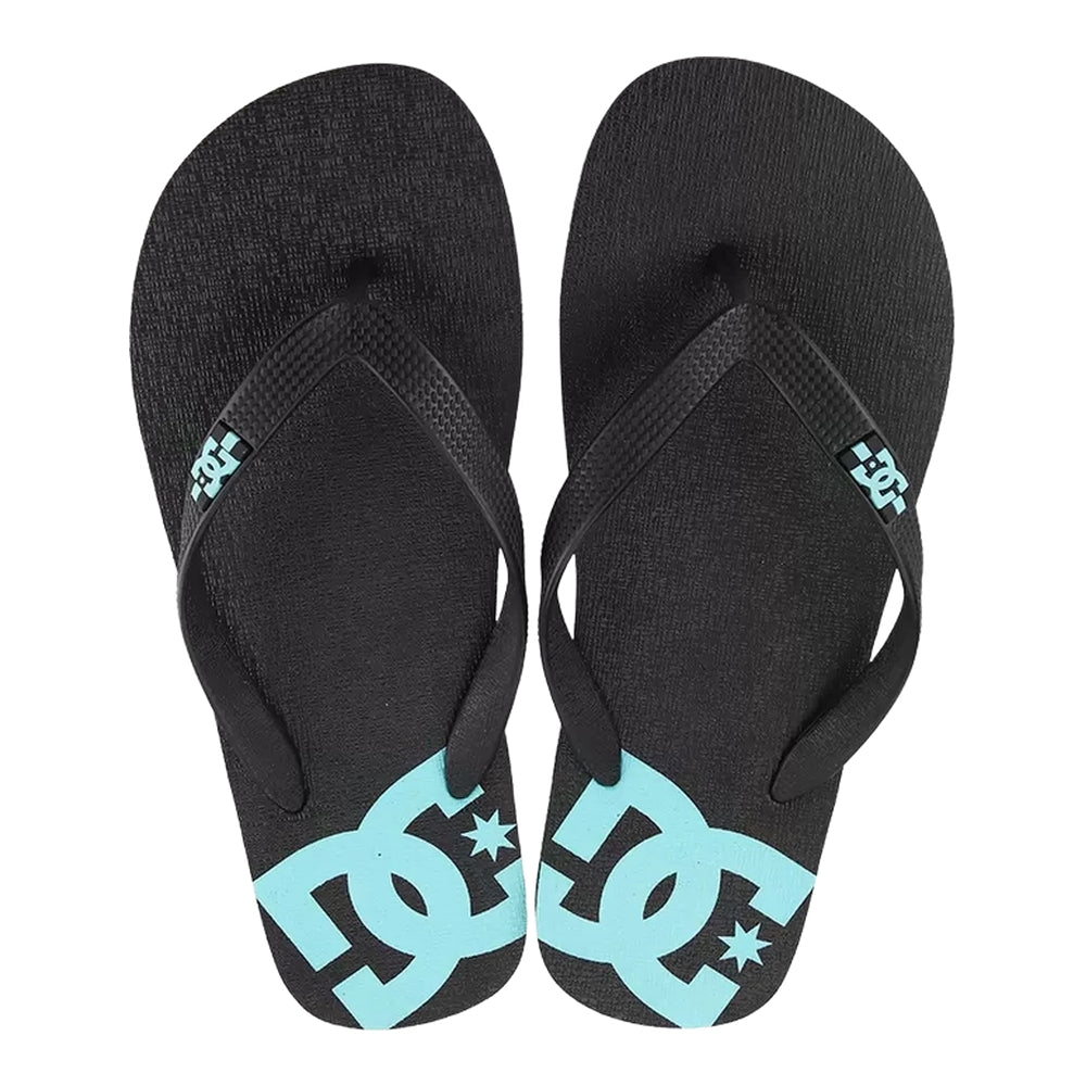 A black slipper with black straps and light blue DC logo designs.