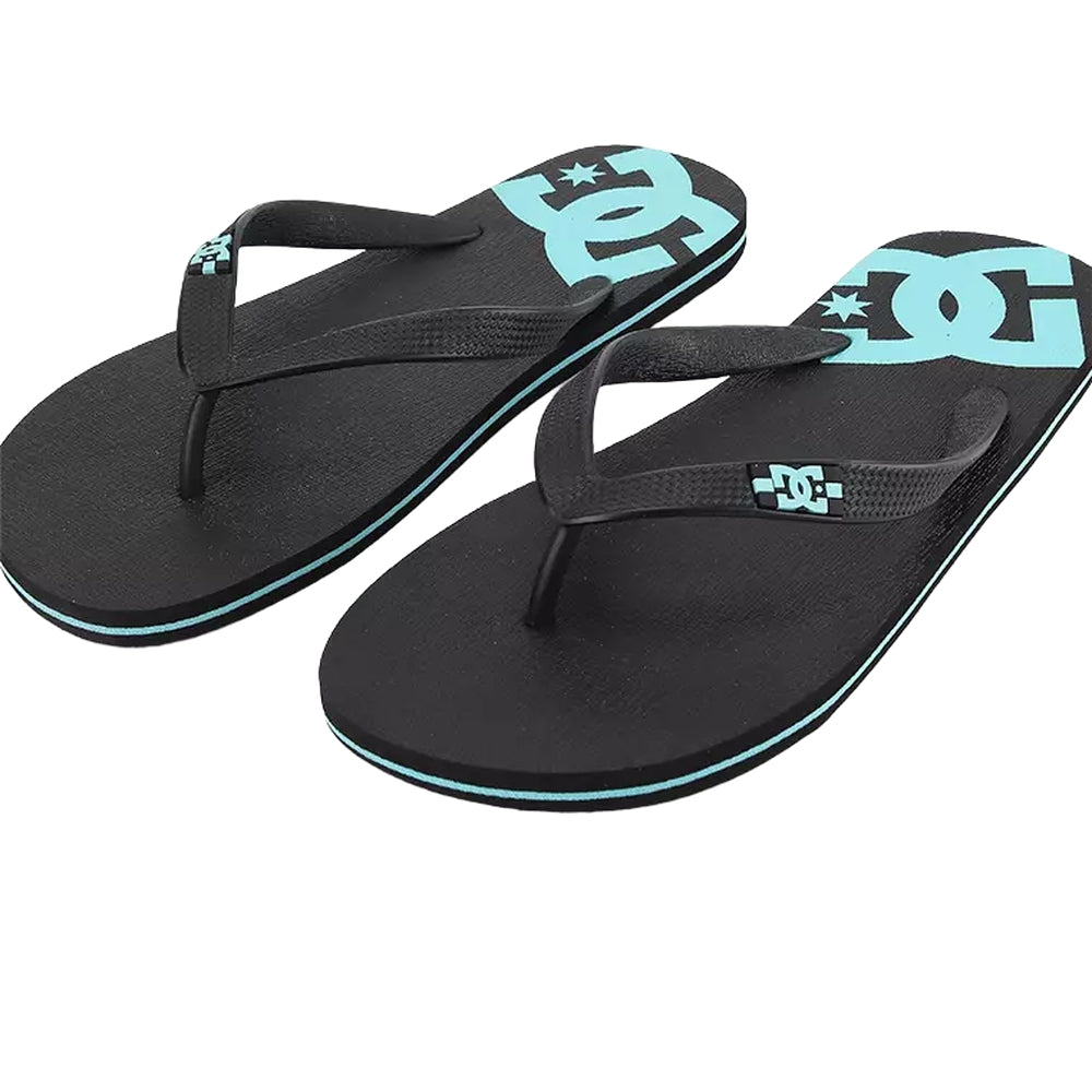 A black slipper with black straps and light blue DC logo designs.