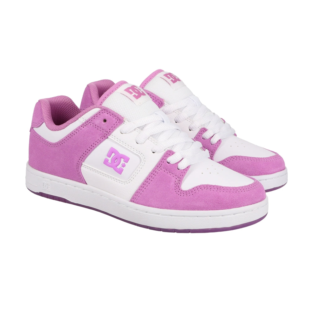 A pair of white and pink DC shoes.