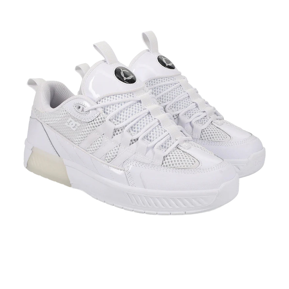 A pair of white DC shoes.